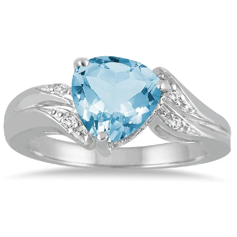 Gemstone rings featuring floral stones for romance -2 1/4 Carat Trillion Cut Blue Topaz and Diamond Ring in 10K White Gold