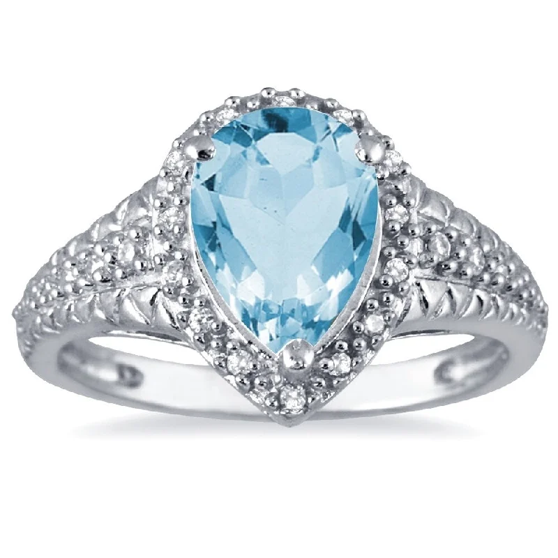 Gemstone rings featuring aquamarine for cool blue tones -2 Carat Pear Shaped Blue Topaz and Diamond Ring in 10K White Gold