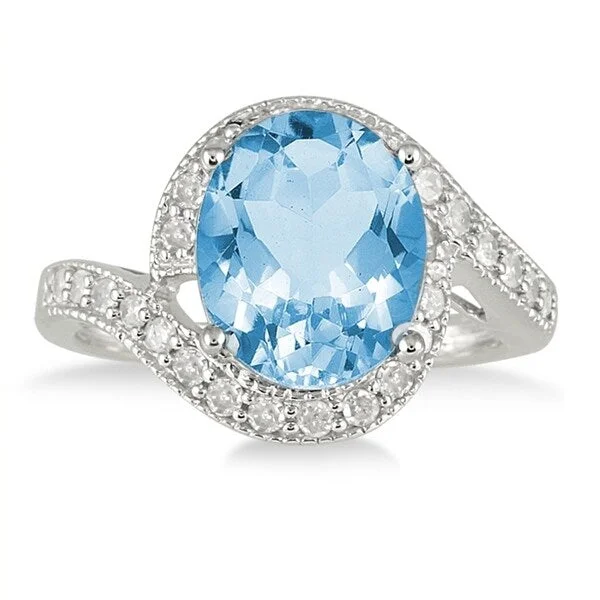 Gemstone rings with rose gold for warm glow -5 Carat Oval Blue Topaz and Diamond Ring in 10K White Gold