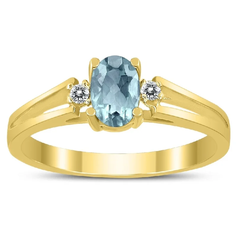 Gemstone rings featuring vivid stones for fierce style -6X4MM Aquamarine and Diamond Open Three Stone Ring in 10K Yellow Gold