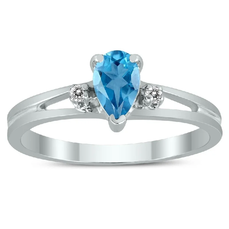 Luxurious gemstone rings showcasing brilliant large stones -6X4MM Blue Topaz and Diamond Pear Shaped Open Three Stone Ring in 10K White Gold