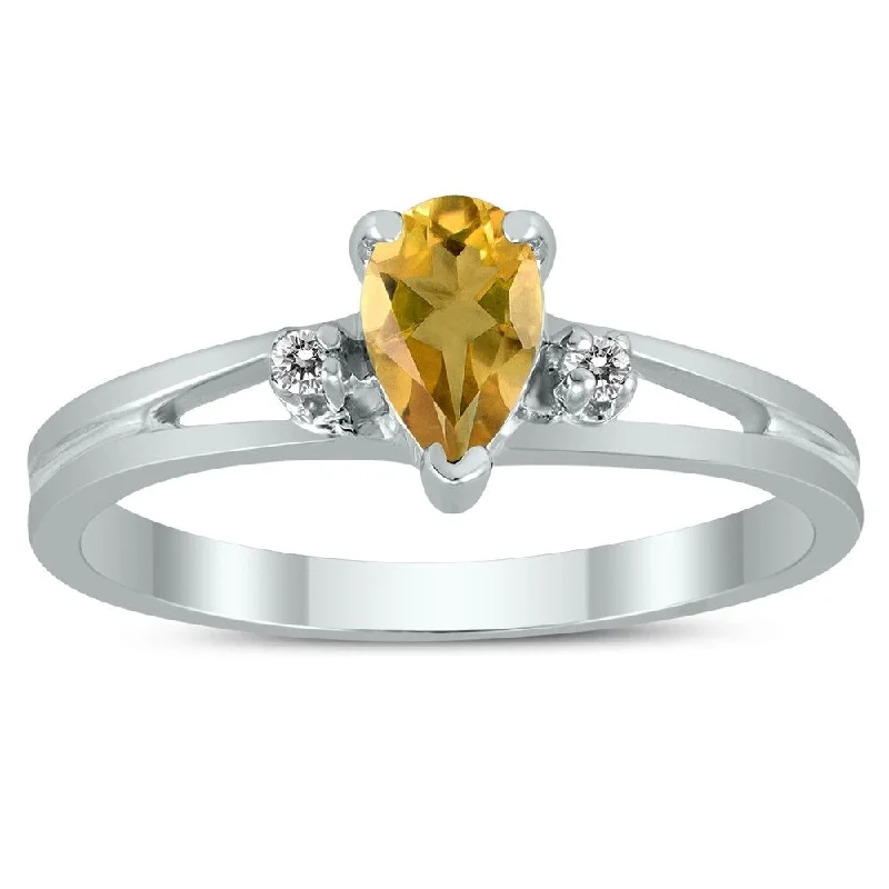 Gemstone rings made with lab-grown stone ethics -6X4MM Citrine and Diamond Pear Shaped Open Three Stone Ring in 10K White Gold