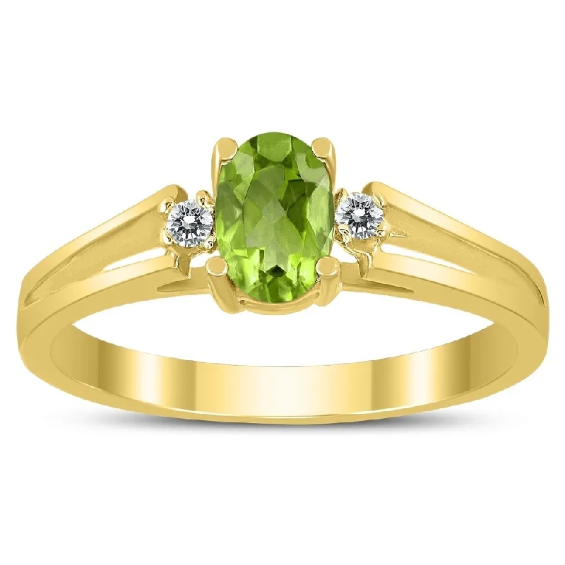 Gemstone rings featuring ruby for bold red shine -6X4MM Peridot and Diamond Open Three Stone Ring in 10K Yellow Gold