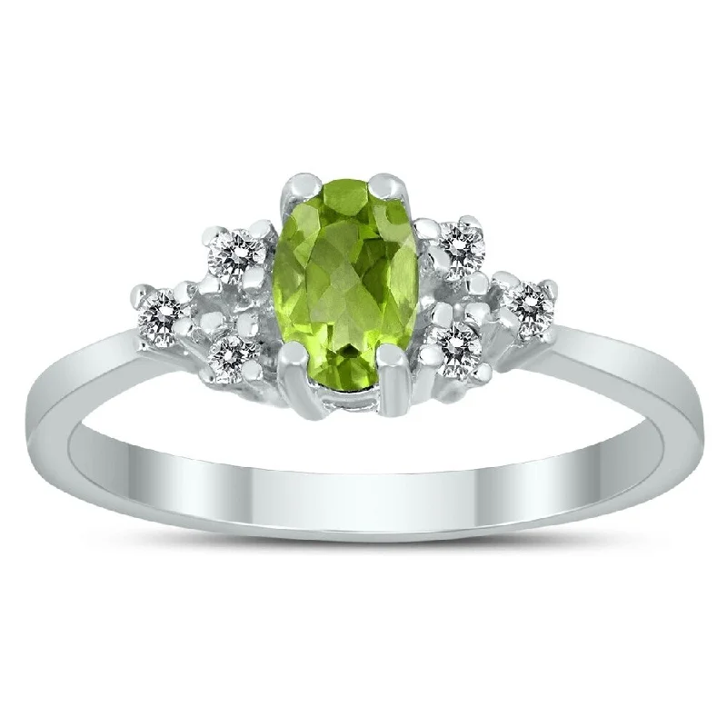 Drop gemstone rings with long stone elegance -6X4MM Peridot and Diamond Regal Ring in 10K White Gold