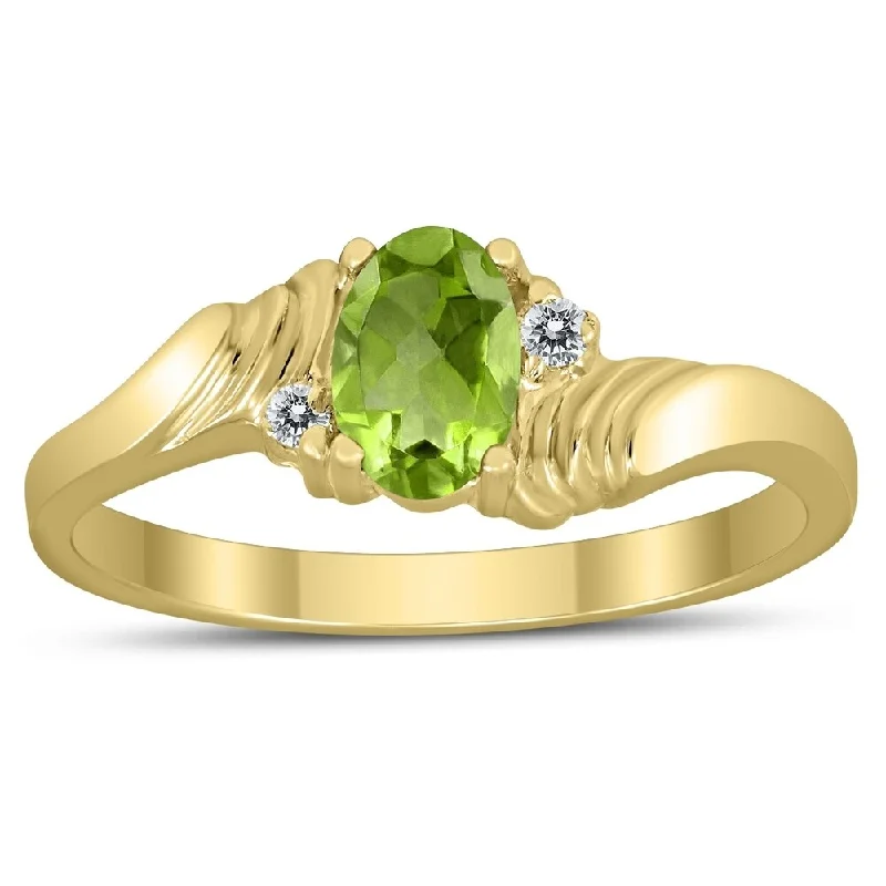 Quartz gemstone rings with clear stone elegance -6X4MM Peridot and Diamond Wave Ring in 10K Yellow Gold