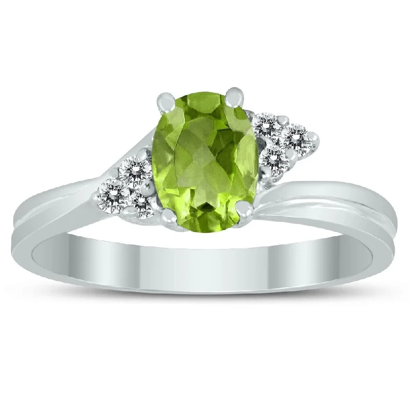 Striking gemstone rings with unique stone shapes -7X5MM Peridot and Diamond Twist Ring in 10K White Gold