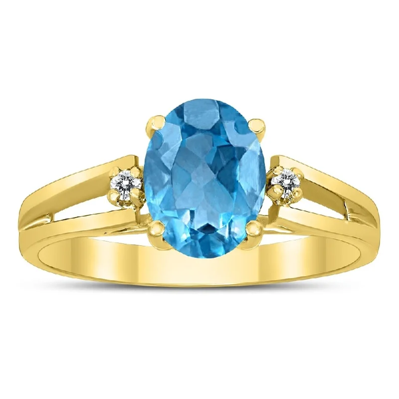 Chunky gemstone rings for big finger statements -8X6MM Blue Topaz and Diamond Open Three Stone Ring in 10K Yellow Gold