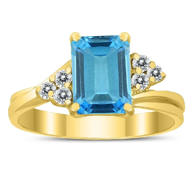 Gemstone rings with emerald for rich green allure -8X6MM Blue Topaz and Diamond Twist Ring in 10K Yellow Gold