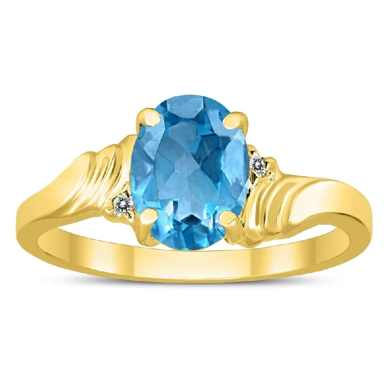 Quartz gemstone rings with clear stone elegance -8X6MM Blue Topaz and Diamond Wave Ring in 10K Yellow Gold