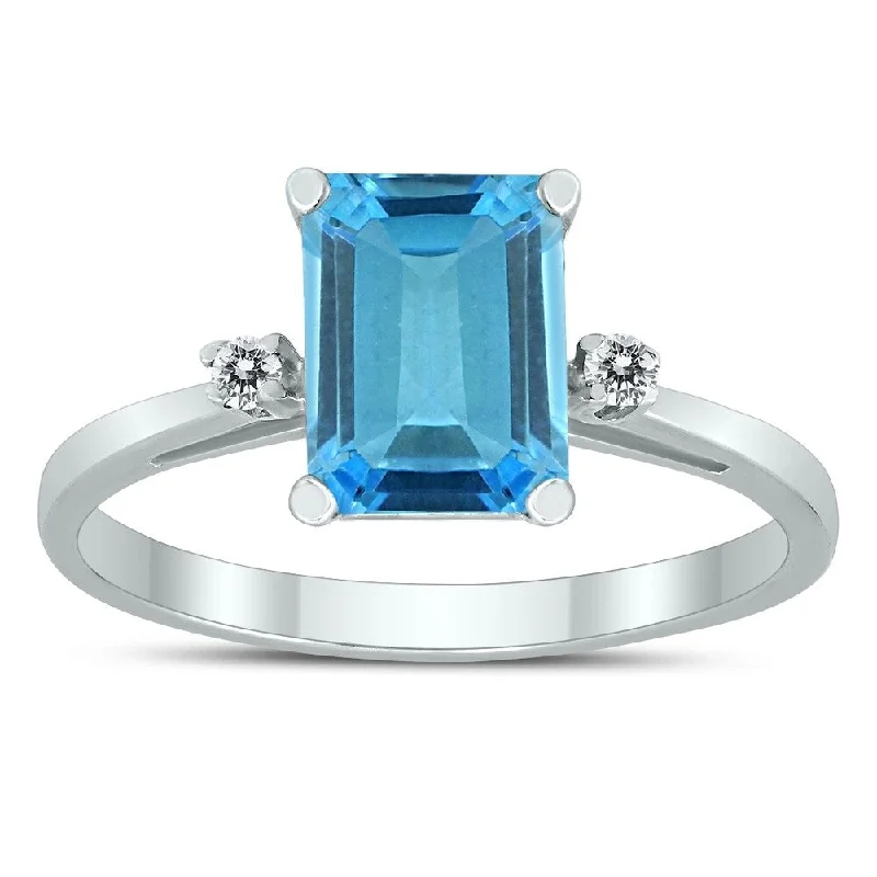 Etched gemstone rings with detailed stone flair -Emerald Cut 8X6MM Blue Topaz and Diamond Three Stone Ring in 10K White Gold