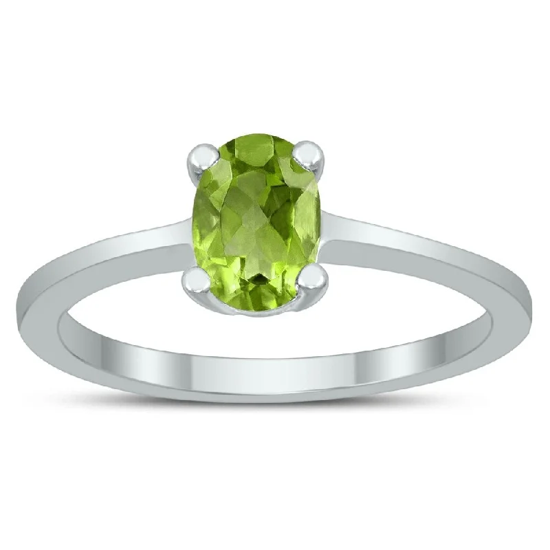 Gemstone rings inspired by stars with stone sparkle -Oval Solitaire 7X5MM Peridot Ring in 10K White Gold