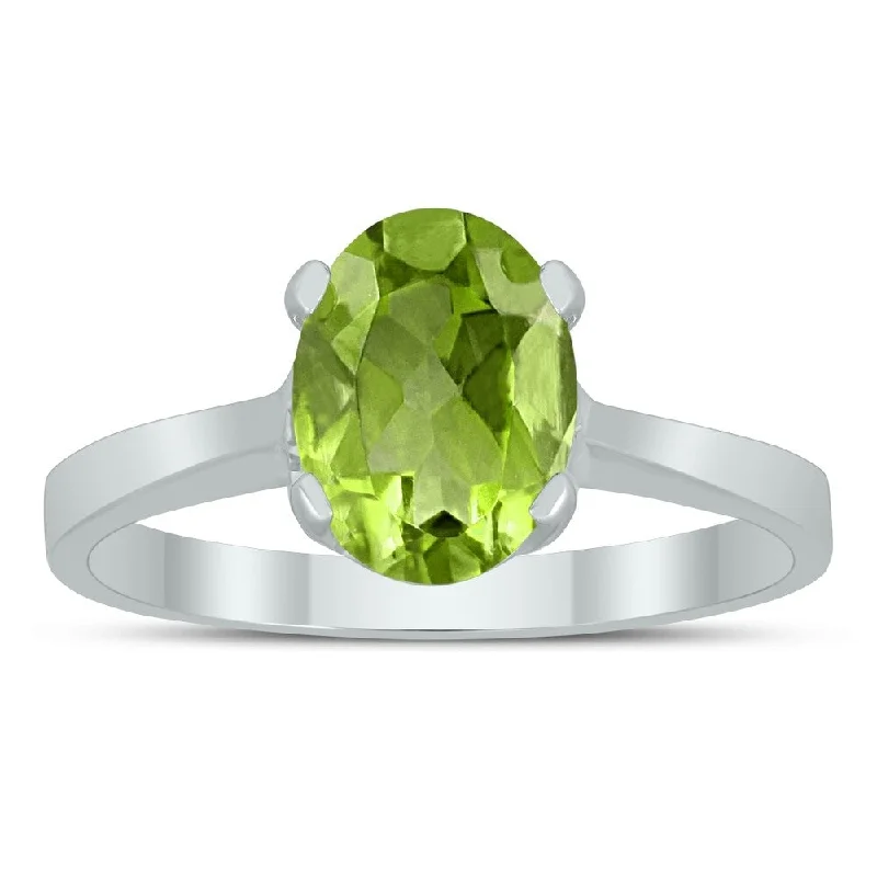 Gemstone rings with white gold for sleek shine -Oval Solitaire 8X6MM Peridot Ring in 10K White Gold