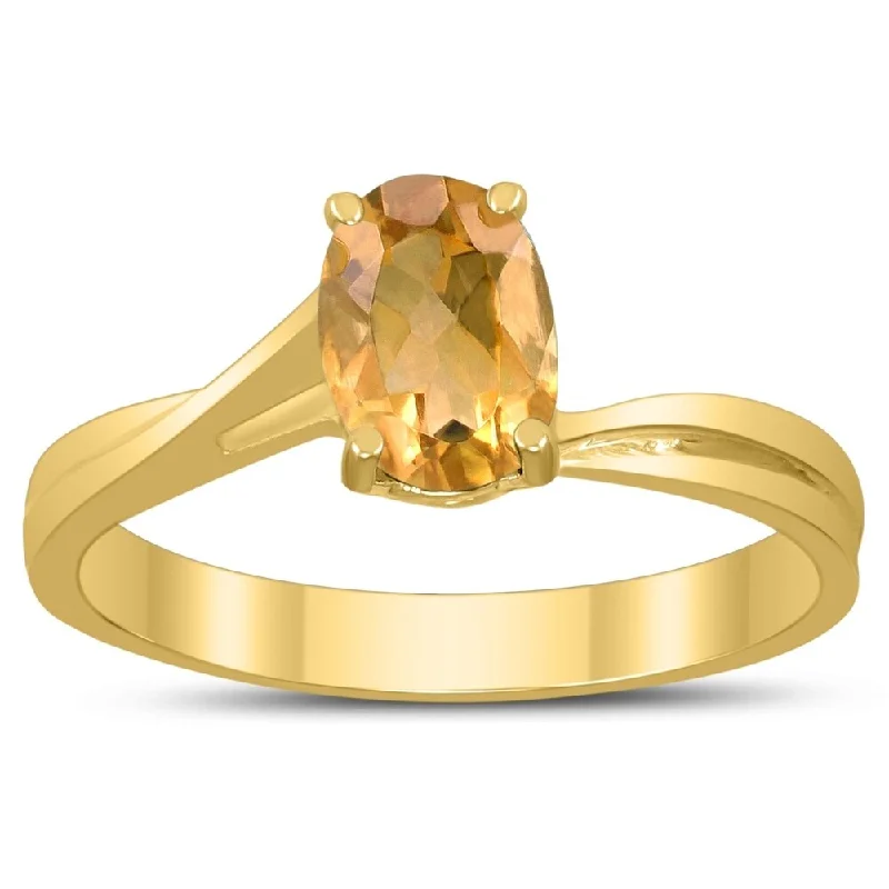 Vibrant gemstone rings perfect for colorful finger flair -Solitaire Oval 7X5MM Citrine Gemstone Twist Ring in 10K Yellow Gold