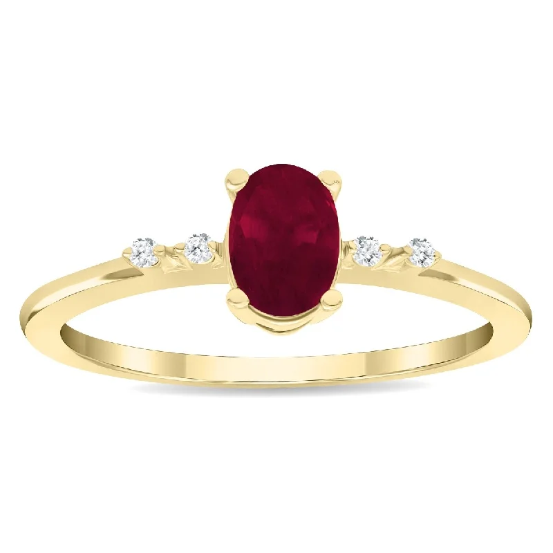 Gemstone rings with emerald for rich green allure -Women's Oval Shaped Ruby and Diamond Sparkle Ring in 10K Yellow Gold