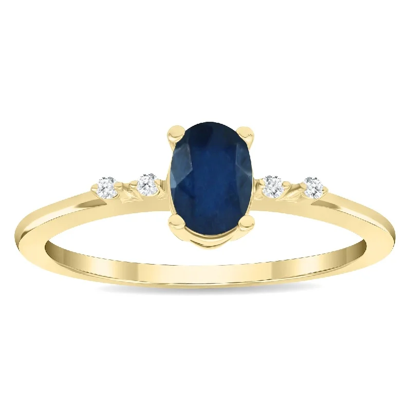 Gemstone rings featuring aquamarine for cool blue tones -Women's Oval Shaped Sapphire and Diamond Sparkle Ring in 10K Yellow Gold