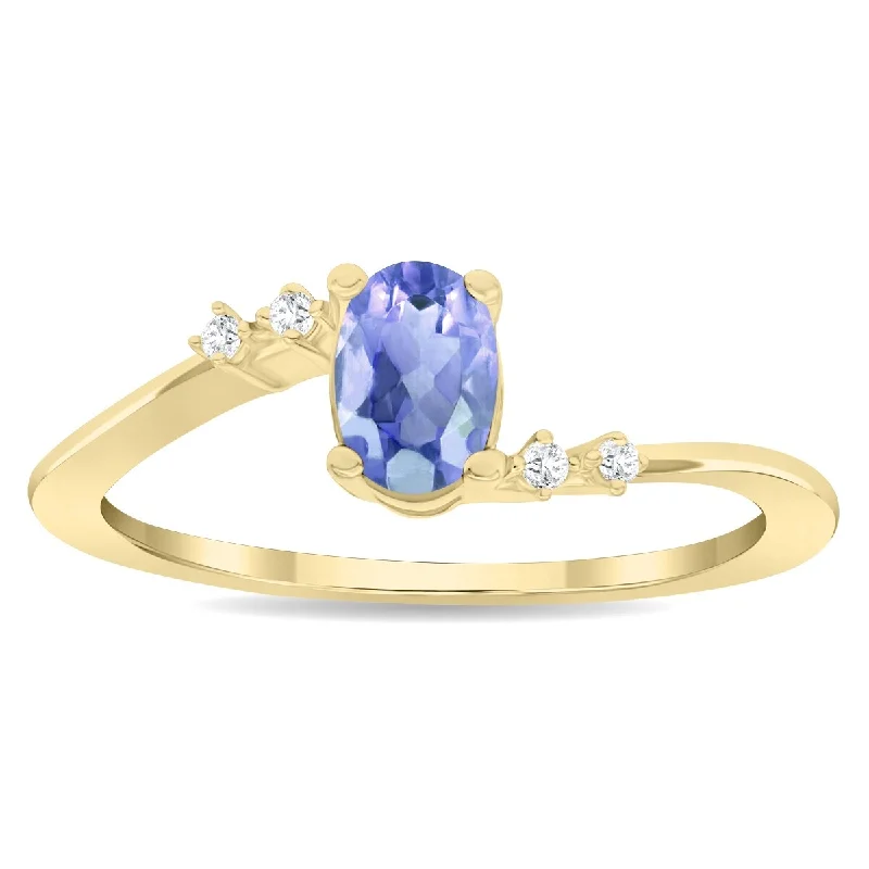 Chakra gemstone rings with stones for balance -Women's Oval Shaped Tanzanite and Diamond Tierra Ring in 10K Yellow Gold