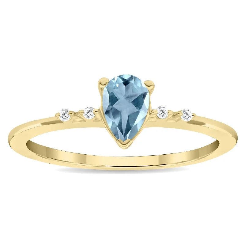 Drop gemstone rings with long stone elegance -Women's Pear Shaped Aquamarine and Diamond Sparkle Ring in 10K Yellow Gold