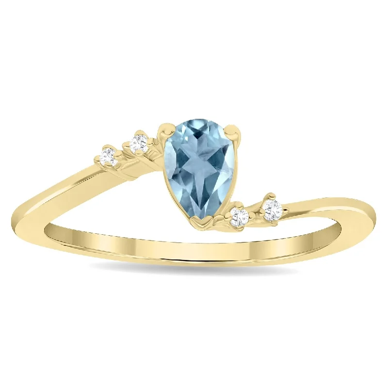 Gemstone rings featuring flexible bands for comfort -Women's Pear Shaped Aquamarine and Diamond Wave Ring in 10K Yellow Gold