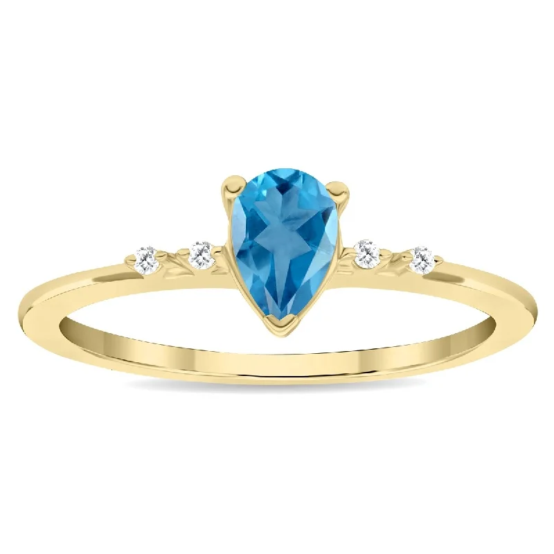 Gemstone rings inspired by vintage stone glamour -Women's Pear Shaped Blue Topaz and Diamond Sparkle Ring in 10K Yellow Gold