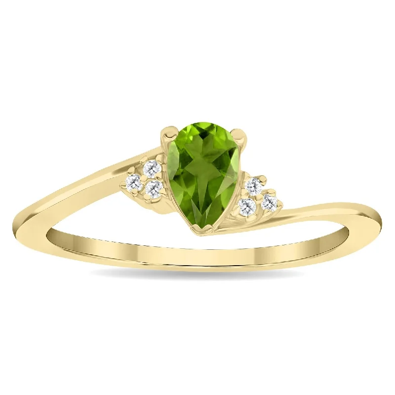 Trendy gemstone rings with modern stone cuts -Women's Pear Shaped Peridot and Diamond Tierra Ring in 10K Yellow Gold