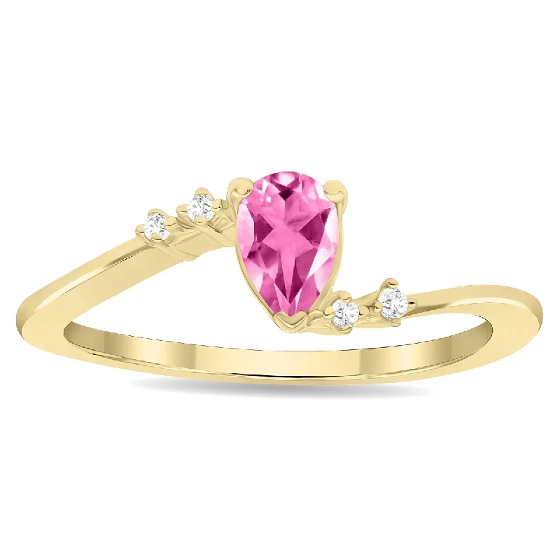 Chakra gemstone rings with stones for balance -Women's Pear Shaped Pink Topaz and Diamond Wave Ring in 10K Yellow Gold