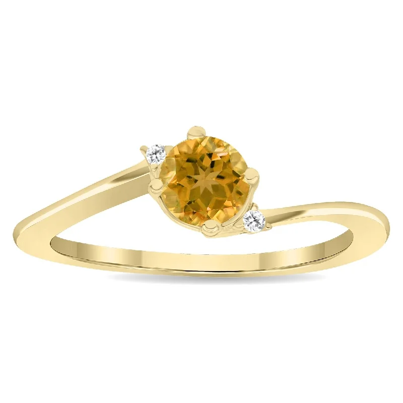 Curved gemstone rings perfect for band pairing -Women's Round Shaped Citrine and Diamond Wave Ring in 10K Yellow Gold