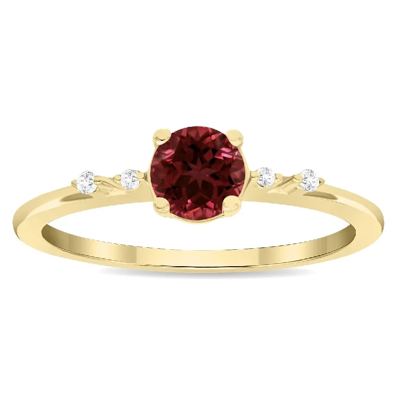 Gemstone rings featuring flexible bands for comfort -Women's Round Shaped Garnet and Diamond Sparkle Ring in 10K Yellow Gold