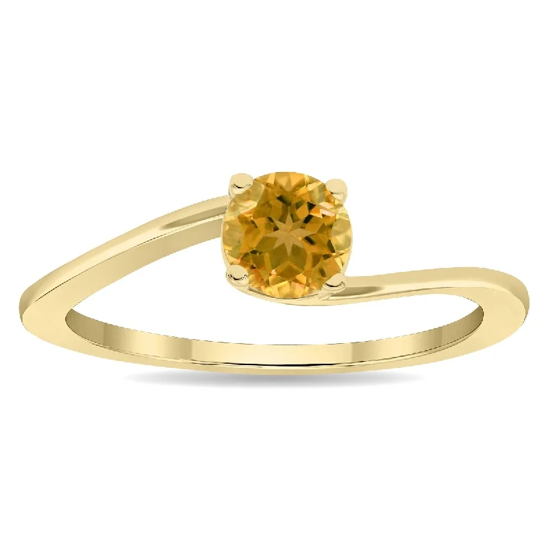 Gemstone rings featuring vivid stones for fierce style -Women's Round Shaped Solitaire Citrine Wave Ring in 10K Yellow Gold