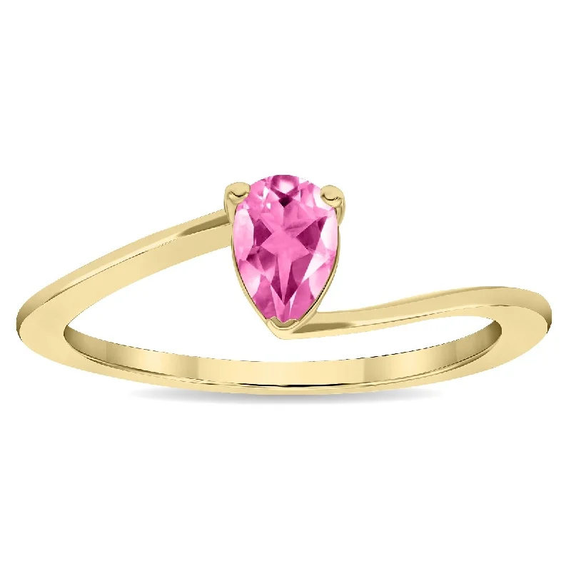 Sleek gemstone rings with floating stone settings -Women's Solitaire Pear Shaped Pink Topaz Wave Ring in 10K Yellow Gold