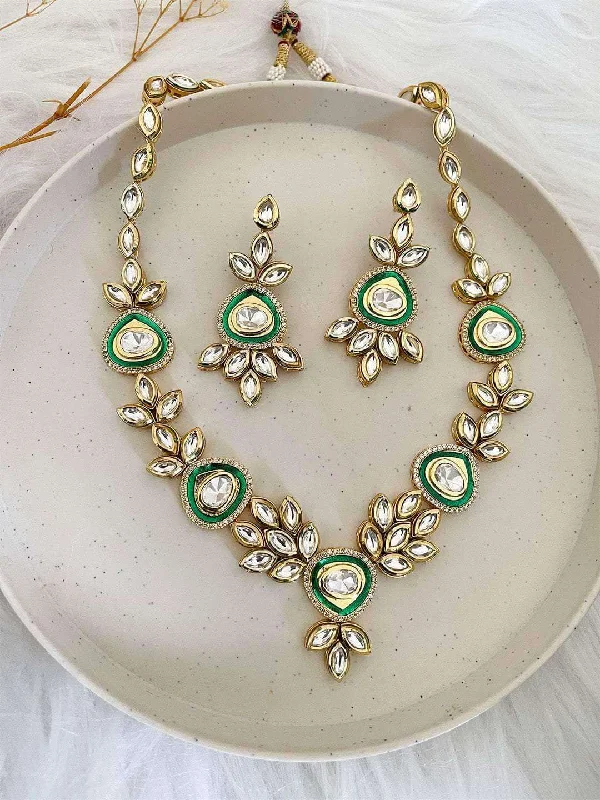 Designer gold necklaces with pendants for high-end, luxury fashion statements -Anjani Green Polki Necklace Set