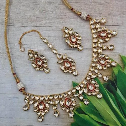 Chunky statement necklaces and pendants with vibrant gemstones for eye-catching appeal -Simple Red Meena Kundan Necklace Set