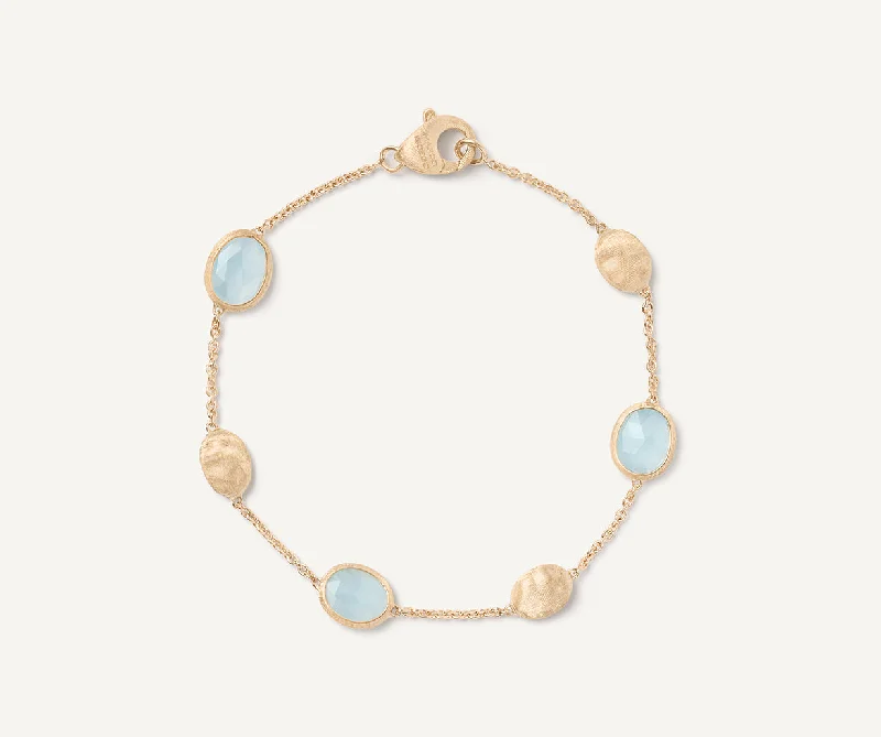 Pearl Bangles for Elegant Appeal-18K Yellow Gold Aquamarine & Gold Bracelet