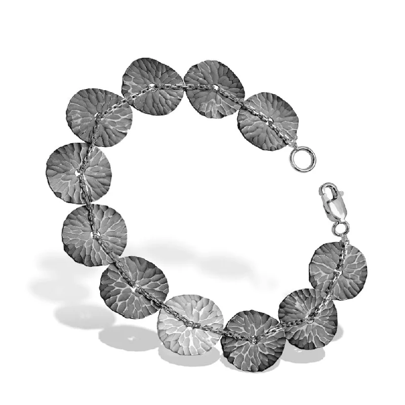 Layered Bangles for Dramatic Effect-Toby Pomeroy Eco Silver Hammered Bracelet